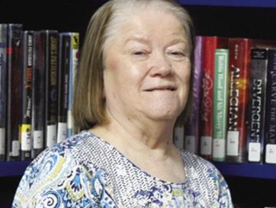 Chris Woodrow retires after years of service to New Boston Library