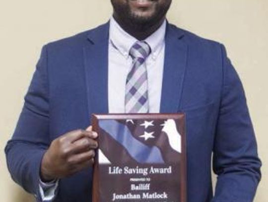 Courthouse bailiff honored for life saving act