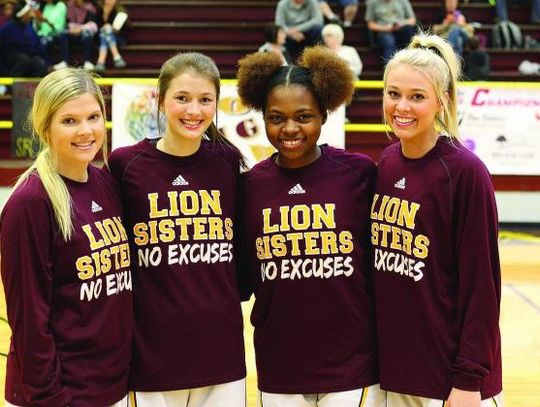 Lady Lions undefeated district champions
