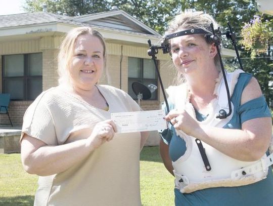 Miller recieves donation from Tribune subscription drive