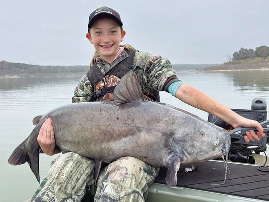 Miss Big Fish--Brownsboro 11-year-old always game for a good fight with a heavyweight cat