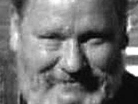 NORMAN E. STRICKLAND,JR.