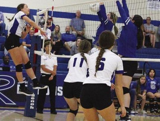 Photo by Tabitha Houchens The Lady Dragons continued their winning ways in district volleyball play with a big win over the Lady
