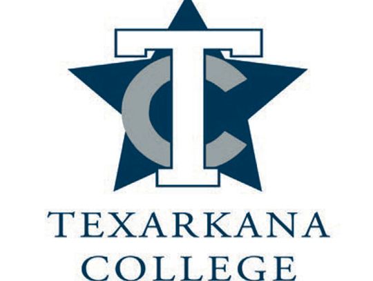 Texarkana College trustees congratulate Board Secretary George Moore for ETBU Alumni