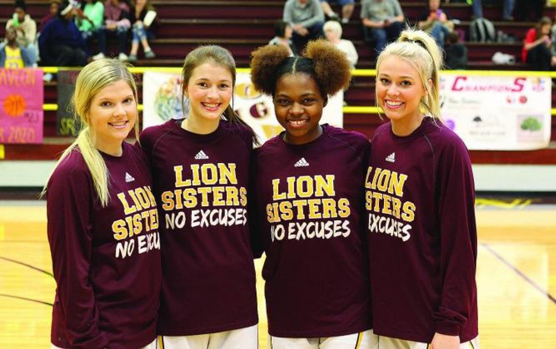 Lady Lions undefeated district champions