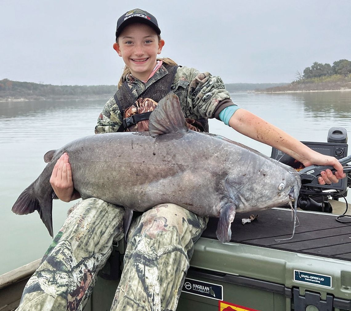 Miss Big Fish--Brownsboro 11-year-old always game for a good fight with a heavyweight cat