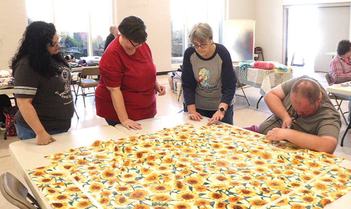 NE Texas volunteers work together for National Make a Blanket Day NE Texas volunteers work together for National Make a Blanket Day