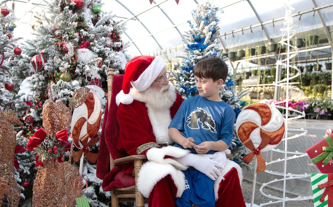 Santa Claus makes an early stop in New Boston